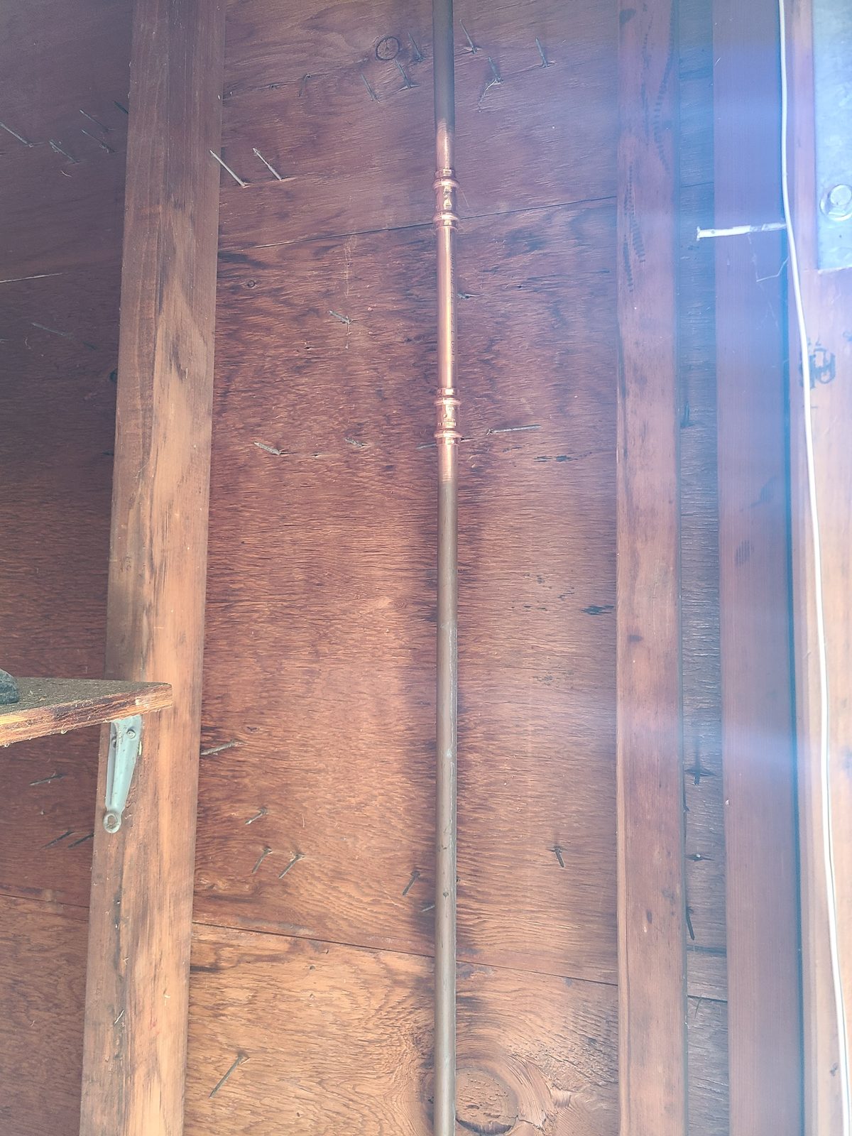 New copper water supply line run through an open wall cavity